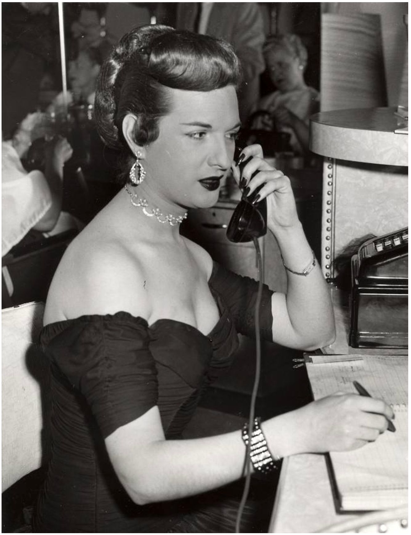 Charlotte McLeod working as a receptionist.